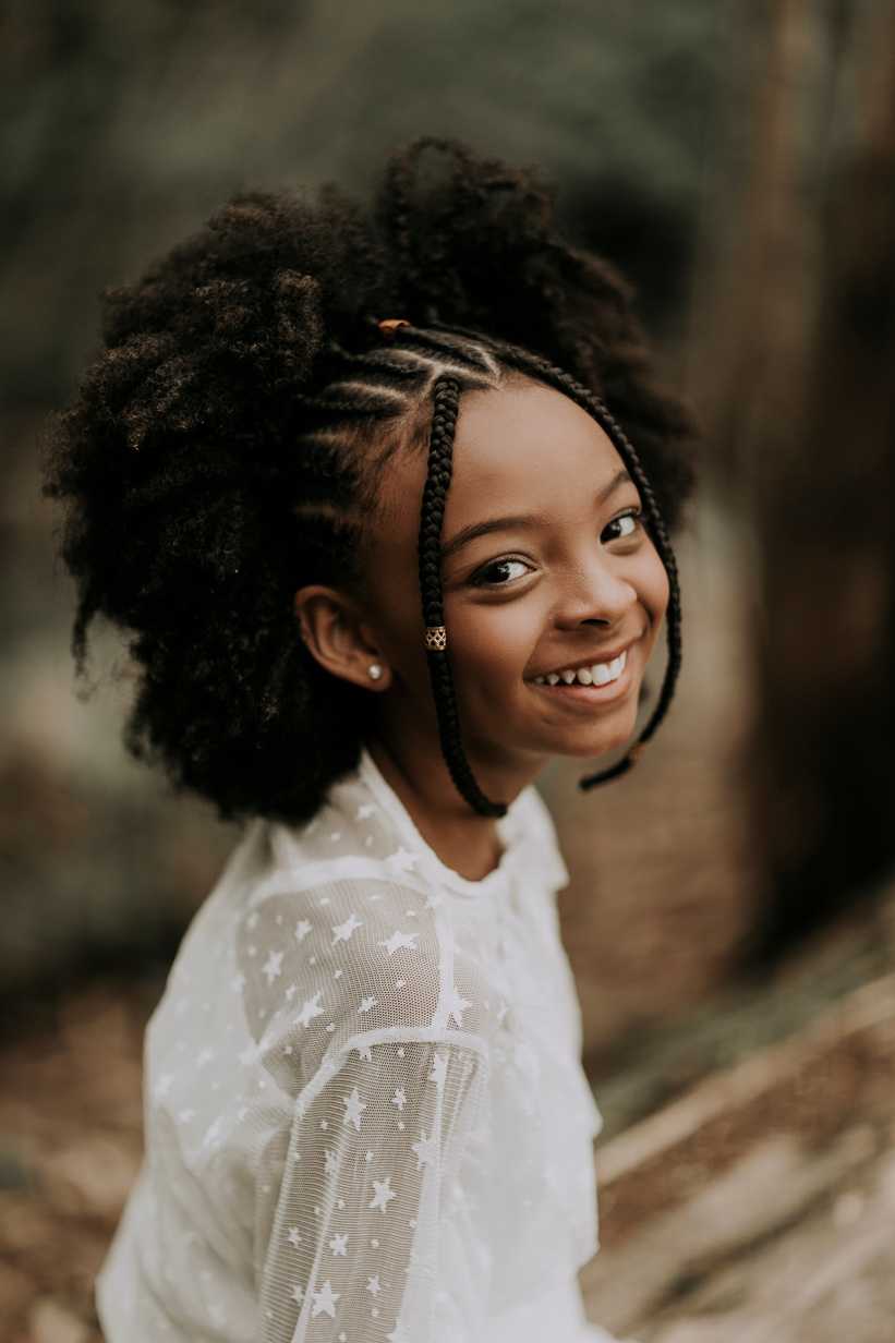 Smiling black girl with Afro